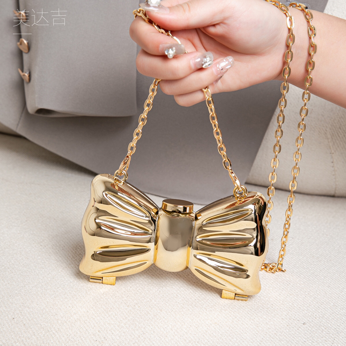 Glanzende gouden metalen strik - Mini Purse Chain recensie en prijs