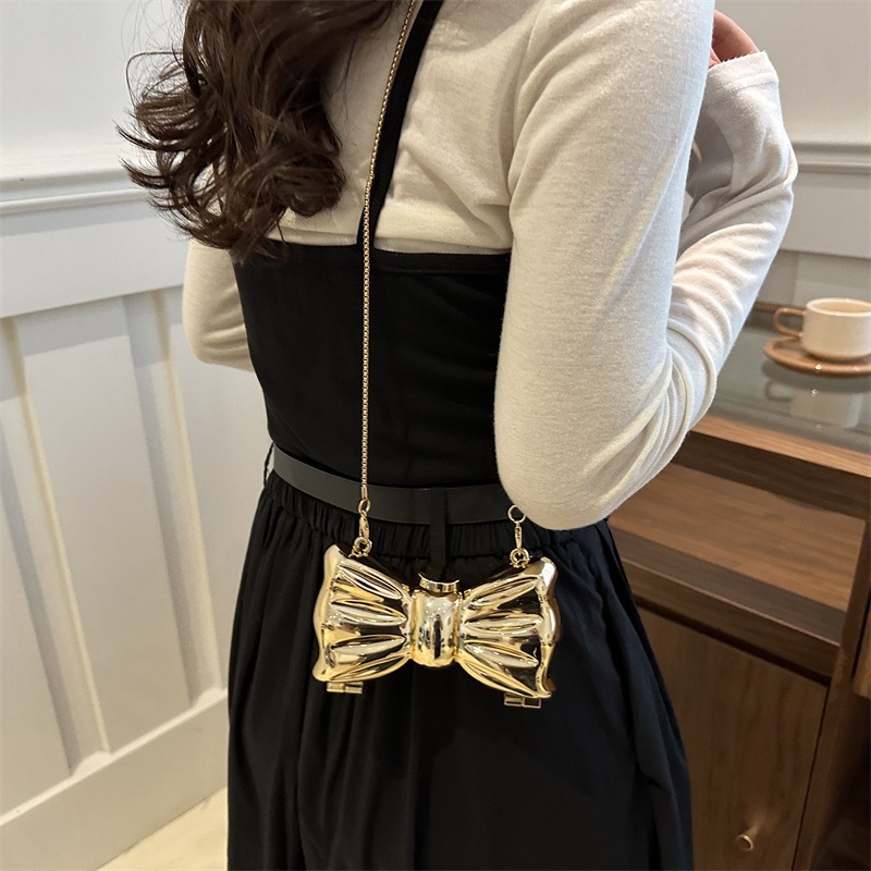 Glanzende gouden metalen strik - Mini Purse Chain recensie en prijs